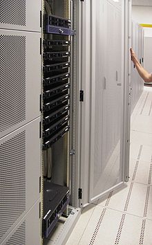 Hosting company servers shown with the computer housing door held open.