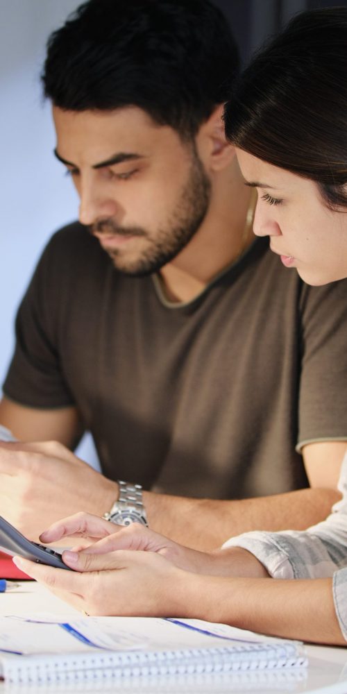 Couple Considering Their Debt Management Options